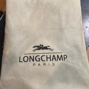 This a beautiful new long champ Paris tote brand new